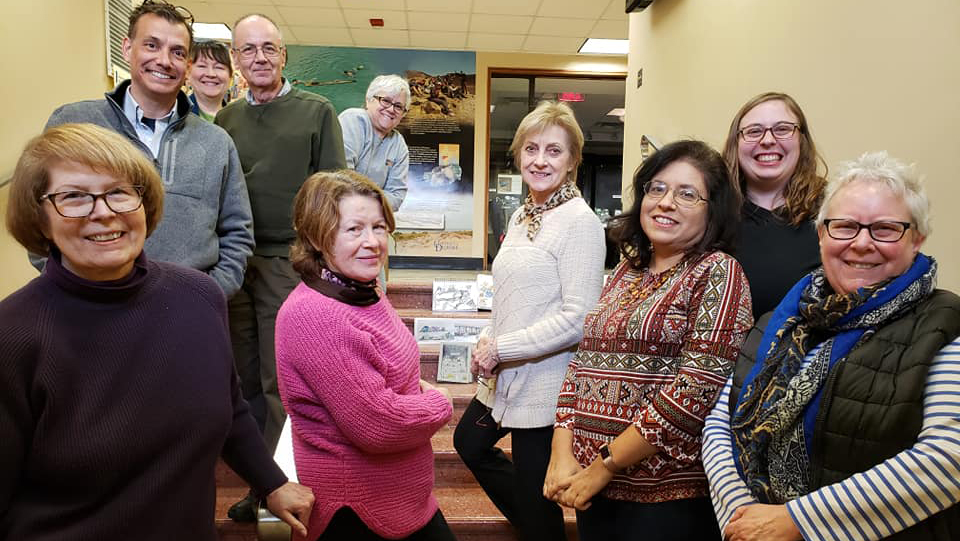 Members of Urban Sketchers Delaware pose for a group photo.