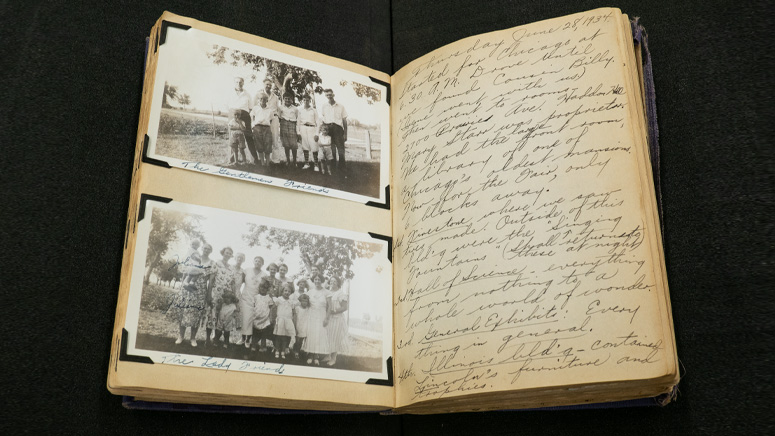 Photo of an old diary with two black and white photos on the left and a handwritten diary entry on the right.