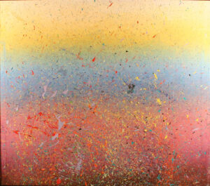 An abstract painting with soft yellow, blue and pink hues and splatters of paint.
