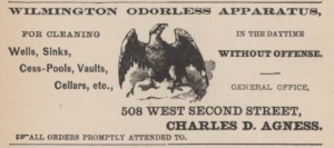 A printed advertisement for "Wilmington Odorless Apparatus." There is also an illustration of an eagle or bird of prey.