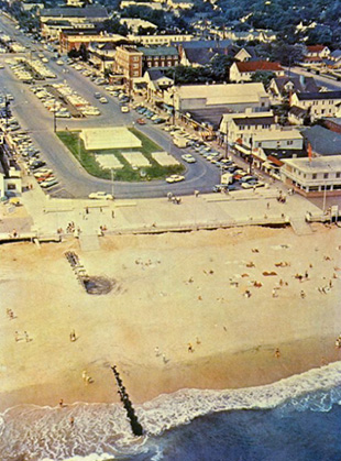 A photograph of a more modern-looking Rehoboth with views of Rehoboth Avenue and the beach