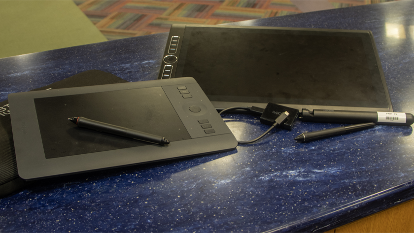 Two Wacom drawing tablets sitting on a countertop