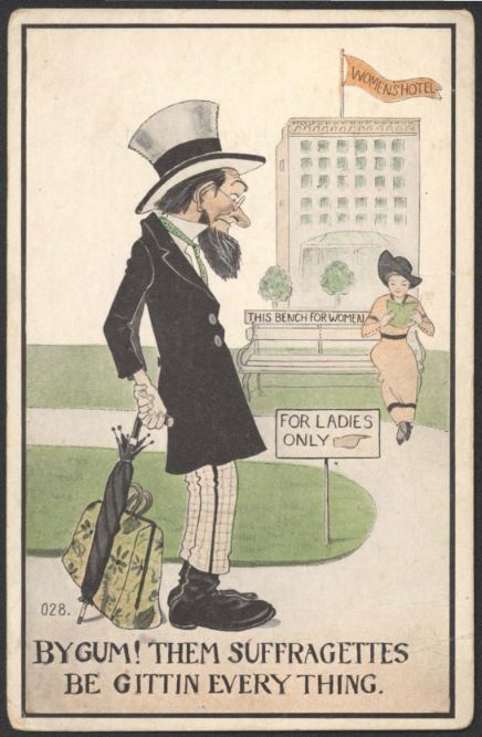 Postcard with an old man standing outside of a "Women's Hotel" and a bench for women only. The caption reads, "By gum! Them suffragettes be gittin every thing."