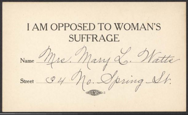 A card that reads, "I am opposed to woman's suffrage" with a line for name and street filled in below.
