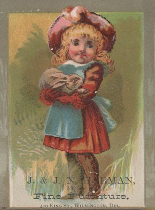 Color illustration of a young girl holding a rabbit. Textual business information.