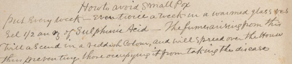 Close-up of a handwritten historical note in dark ink on aged paper describing how to avoid smallpox. The cursive text mentions placing sulphuric acid in a warmed glass vessel to create fumes that spread through a house as a preventative measure.