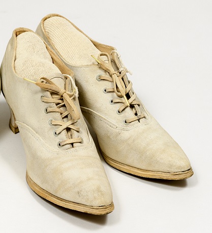 <p>Keds® were created in 1916 by the U.S. Rubber Company of Naugatuck, Connecticut. Active women valued the flexibility and comfort of the Carmen style (shown here).</p>